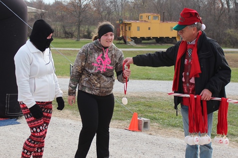 It’s not always about how you start. Sometimes it’s about how you finish. Runners at the Santa Express 5K and Reindeer Route at the National Agricultural Center and Hall of Fame, Bonner Springs, finished their 5K and 1-mile routes Saturday with style. (Photo by Steve Rupert)