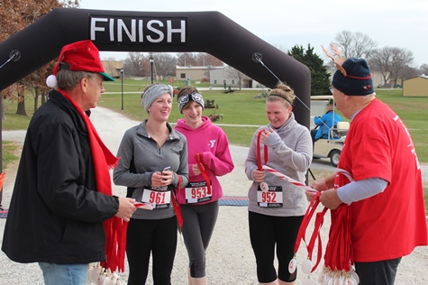 It’s not always about how you start. Sometimes it’s about how you finish. Runners at the Santa Express 5K and Reindeer Route at the National Agricultural Center and Hall of Fame, Bonner Springs, finished their 5K and 1-mile routes Saturday with style. (Photo by Steve Rupert)