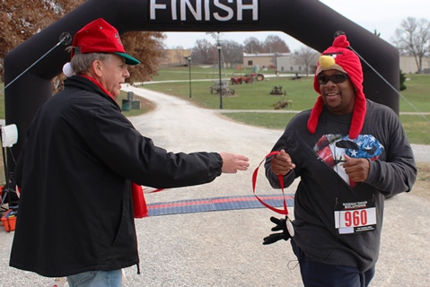 It’s not always about how you start. Sometimes it’s about how you finish. Runners at the Santa Express 5K and Reindeer Route at the National Agricultural Center and Hall of Fame, Bonner Springs, finished their 5K and 1-mile routes Saturday with style. (Photo by Steve Rupert)