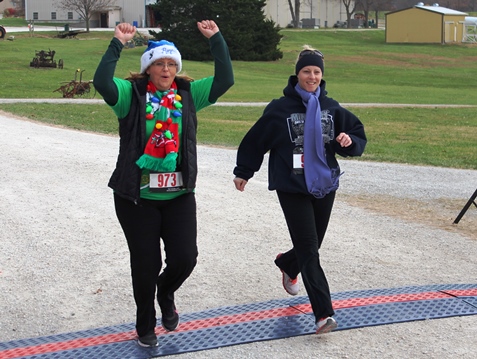 It’s not always about how you start. Sometimes it’s about how you finish. Runners at the Santa Express 5K and Reindeer Route at the National Agricultural Center and Hall of Fame, Bonner Springs, finished their 5K and 1-mile routes Saturday with style. (Photo by Steve Rupert)