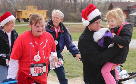 It’s not always about how you start. Sometimes it’s about how you finish. Runners at the Santa Express 5K and Reindeer Route at the National Agricultural Center and Hall of Fame, Bonner Springs, finished their 5K and 1-mile routes Saturday with style. (Photo by Steve Rupert)