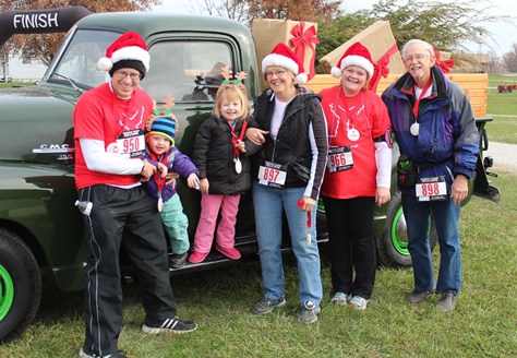 It’s not always about how you start. Sometimes it’s about how you finish. Runners at the Santa Express 5K and Reindeer Route at the National Agricultural Center and Hall of Fame, Bonner Springs, finished their 5K and 1-mile routes Saturday with style. (Photo by Steve Rupert)