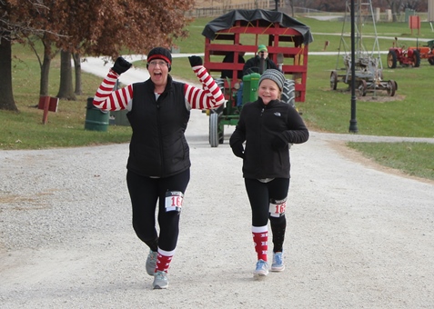 It’s not always about how you start. Sometimes it’s about how you finish. Runners at the Santa Express 5K and Reindeer Route at the National Agricultural Center and Hall of Fame, Bonner Springs, finished their 5K and 1-mile routes Saturday with style. (Photo by Steve Rupert)