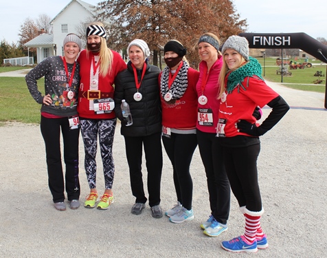 It’s not always about how you start. Sometimes it’s about how you finish. Runners at the Santa Express 5K and Reindeer Route at the National Agricultural Center and Hall of Fame, Bonner Springs, finished their 5K and 1-mile routes Saturday with style. (Photo by Steve Rupert)