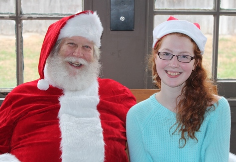 What do I want for Christmas? Let me think ... Children met with Santa Claus on Saturday at the National Agricultural Center and Hall of Fame, Bonner Springs, to talk about their Christmas wishes. More visits with Santa Claus are scheduled from 10 a.m. to 2 p.m. Sunday, Dec. 4, Saturday, Dec. 10, and Sunday, Dec. 11, at the Ag Hall, 126th and State Avenue, Bonner Springs. For more information, visit http://www.aghalloffame.com. (Photo by Steve Rupert)