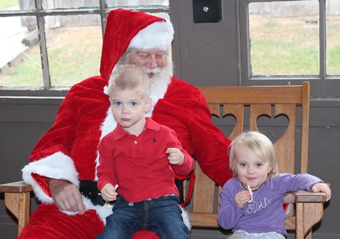 What do I want for Christmas? Let me think ... Children met with Santa Claus on Saturday at the National Agricultural Center and Hall of Fame, Bonner Springs, to talk about their Christmas wishes. More visits with Santa Claus are scheduled from 10 a.m. to 2 p.m. Sunday, Dec. 4, Saturday, Dec. 10, and Sunday, Dec. 11, at the Ag Hall, 126th and State Avenue, Bonner Springs. For more information, visit http://www.aghalloffame.com. (Photo by Steve Rupert)