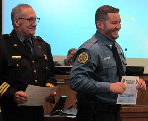 New sheriff’s deputy Timothy Willis displayed his certificate Dec. 15 at graduation ceremonies at Kansas City, Kan., City Hall. (Staff photo by Mary Rupert) 