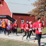 Several runners competed in last year’s Santa Express 5K and Reindeer Route at the National Agricultural Center and Hall of Fame, 126th and State Avenue, Bonner Springs. The event will be held this year on Saturday, Dec. 3, at the Ag Hall. The event includes the 5K run, 1-mile walk, a visit with Santa Claus, a ride on the miniature train, games, crafts, cookies and hot chocolate. (File photo by Steve Rupert)