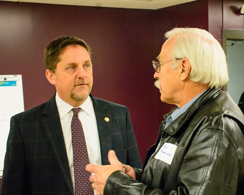 Mark Holland, mayor of Kansas City, Kan., talked with participants following the community dialogue on reducing violence.  (Photo by Brian Turrel)