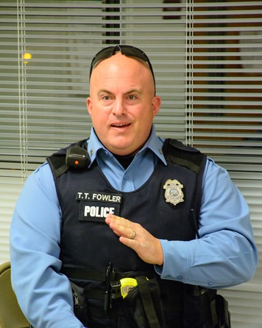 Officer Timothy Fowler of the Kansas City, Kan., Police Department participated in a small group discussion with several local residents. Fowler shared his thoughts about perceptions of the police. (Photo by Brian Turrel)