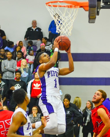 Daviance Covington jumped to the basket for a layup in the fourth quarter. (Photo by Brian Turrel)	