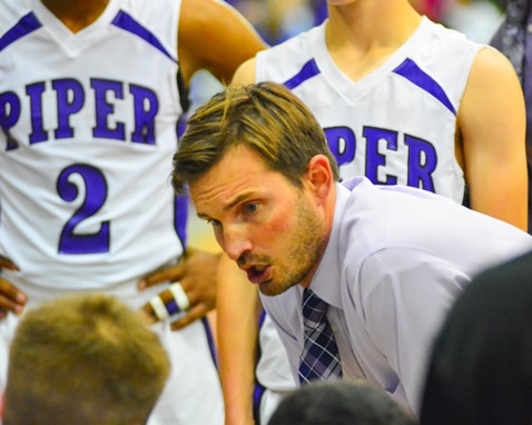 Piper head coach Bryan Shelley encouraged the team during a timeout in the fourth quarter. (Photo by Brian Turrel)