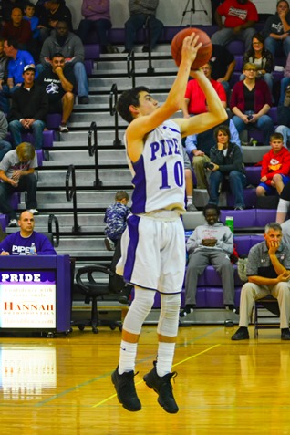 Piper senior Jordan Goodpastor (10) took a three-point jump shot during the second quarter. (Photo by Brian Turrel)