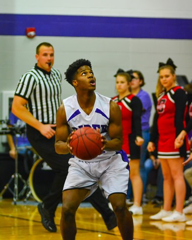 Piper senior Jordan Goodpastor (10) took a three-point jump shot during the second quarter. (Photo by Brian Turrel)