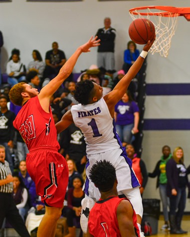 Daviance Covington went for a layup on a fast break in the fourth quarter. (Photo by Brian Turrel)	