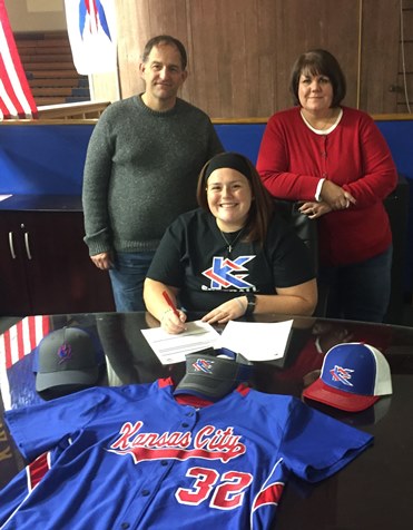 Flanked by her parents, Charles and Kelly Greene, pitcher-first baseman Shannon Greene posed for a signing picture. She signed a letter of intent to play softball at Kansas City Kansas Community College this coming spring. (KCKCC photo) 